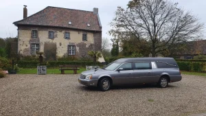 Cadillac grijze rouwauto - foto 5